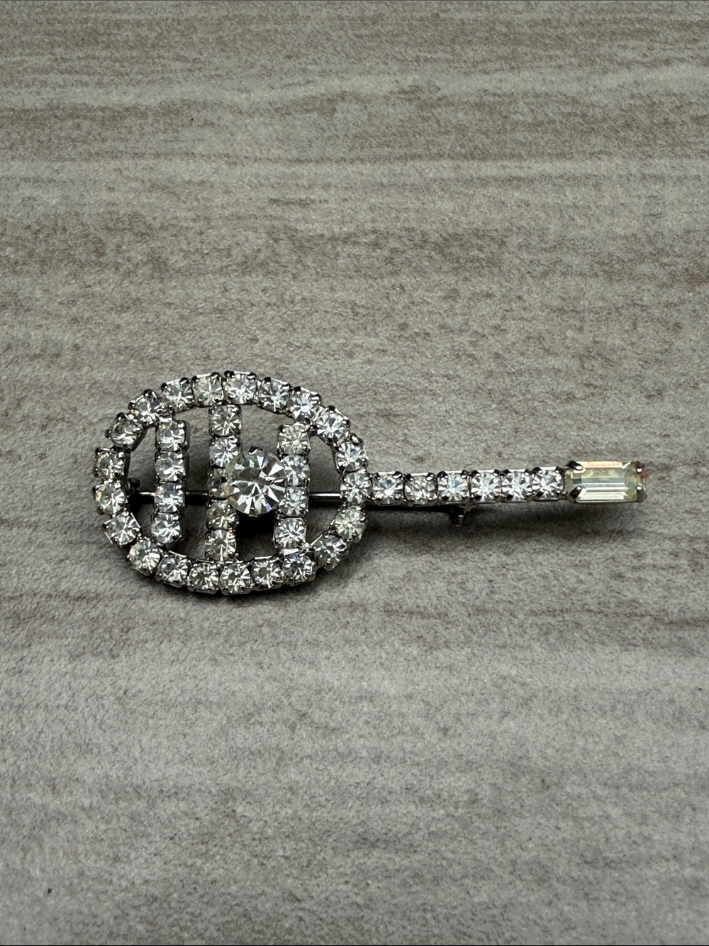 Vintage 1960s pronged rhinestone tennis racket brooch